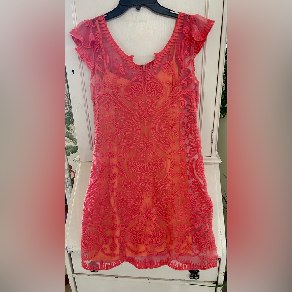 Like new exquisite, filigree embroidered dress size 10 color coral-pinkish